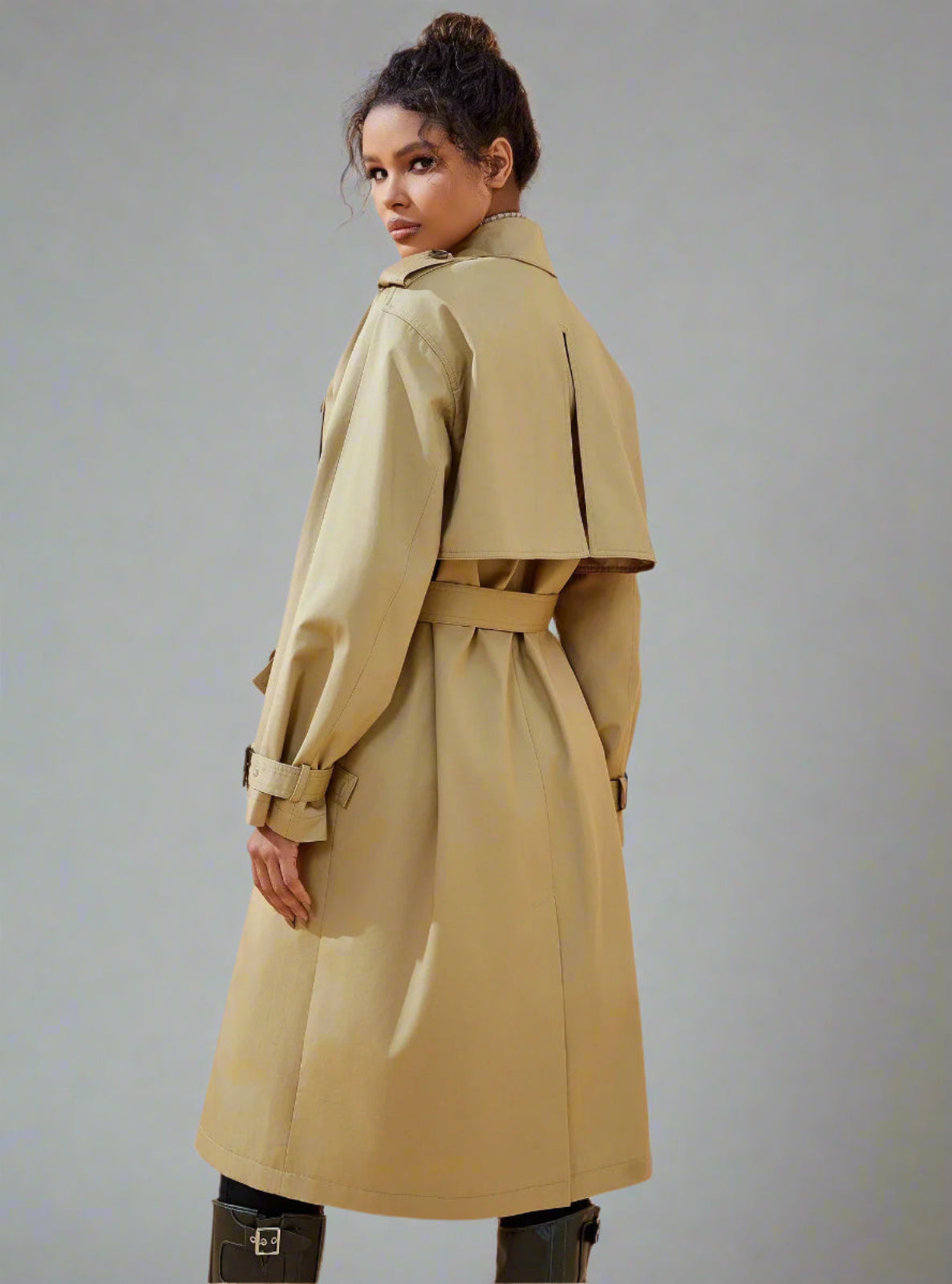 Woman wearing a beige trench coat 