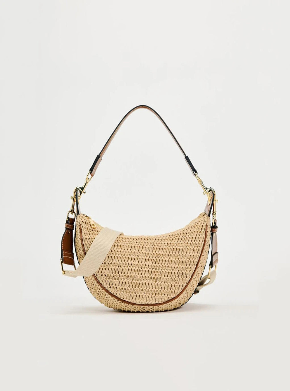Woven handbag with a strap on a light beige background