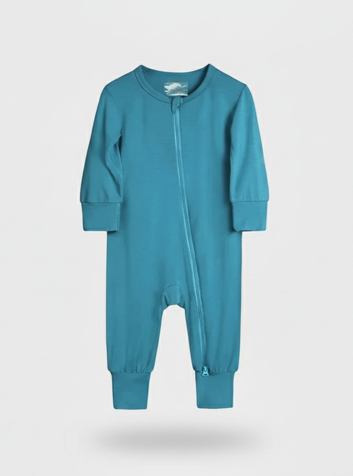 Teal baby onesie with a zipper on a light gray background