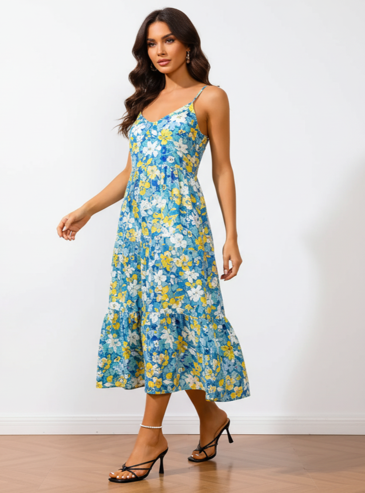 Woman wearing a blue floral dress on a white background