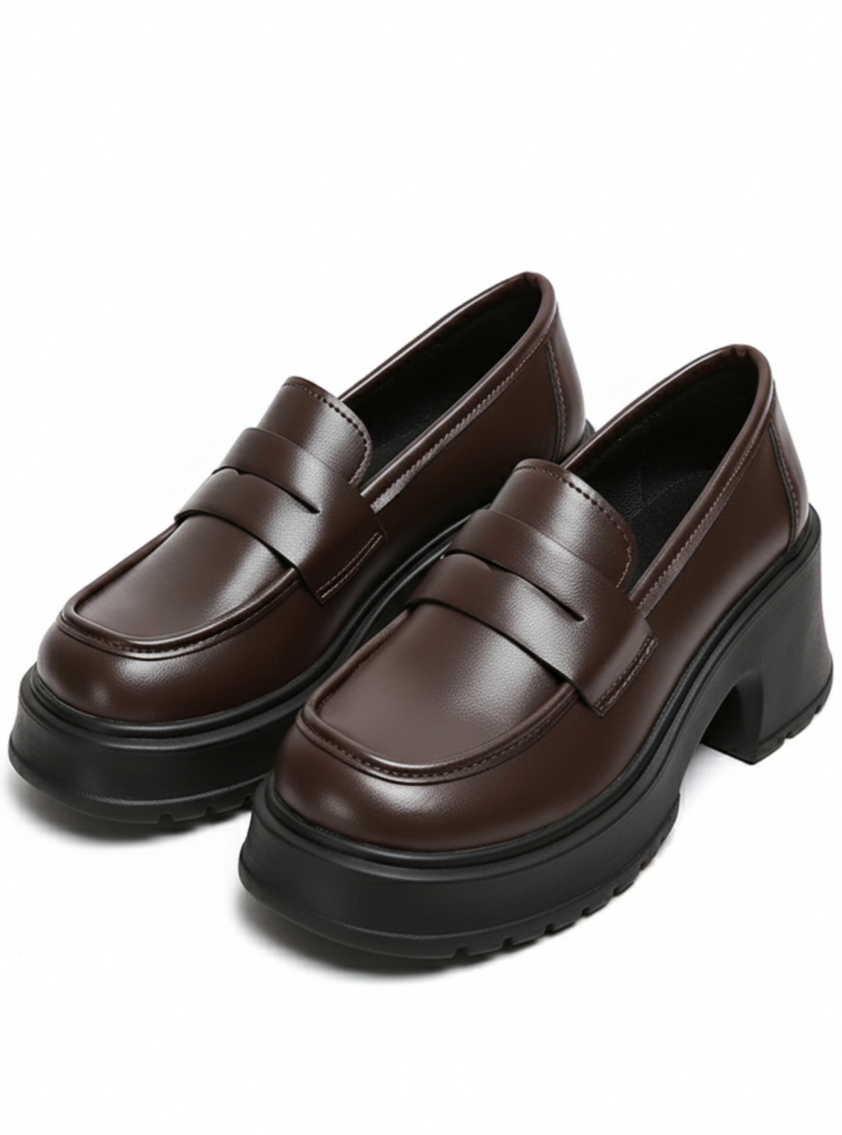 Pair of brown loafers on a white background