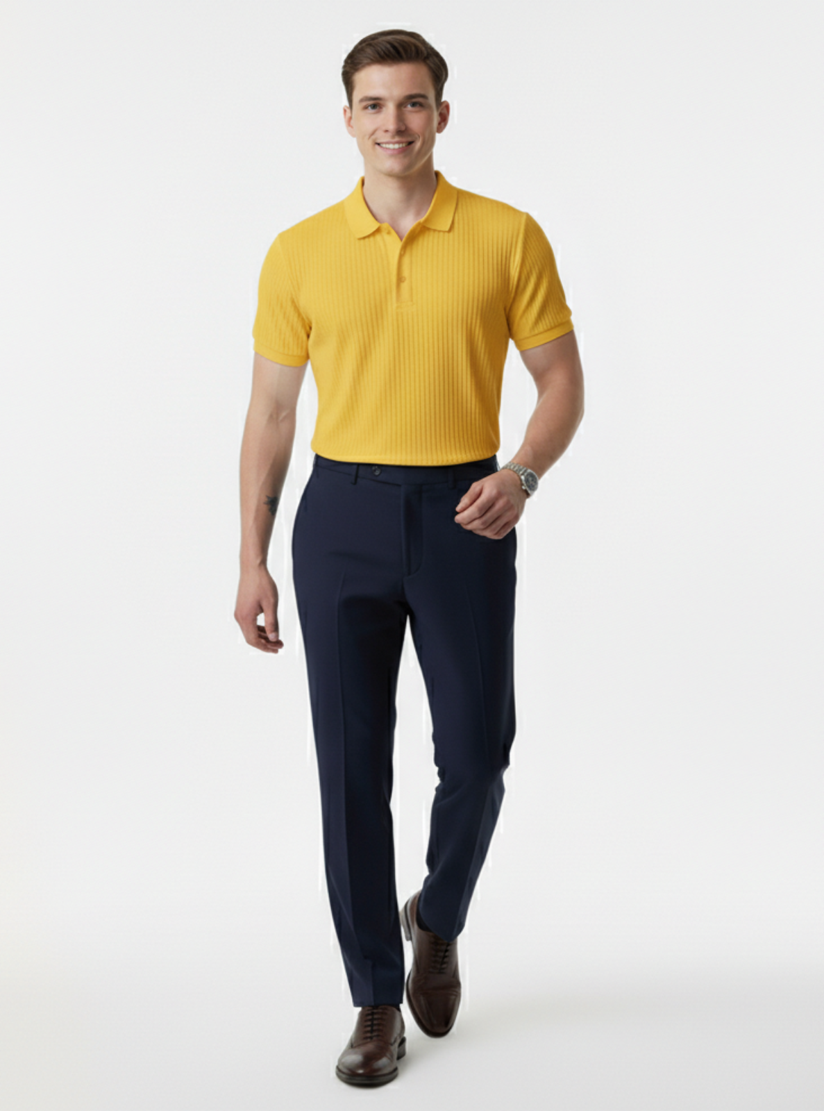 Man wearing a yellow polo shirt and navy pants on a white background