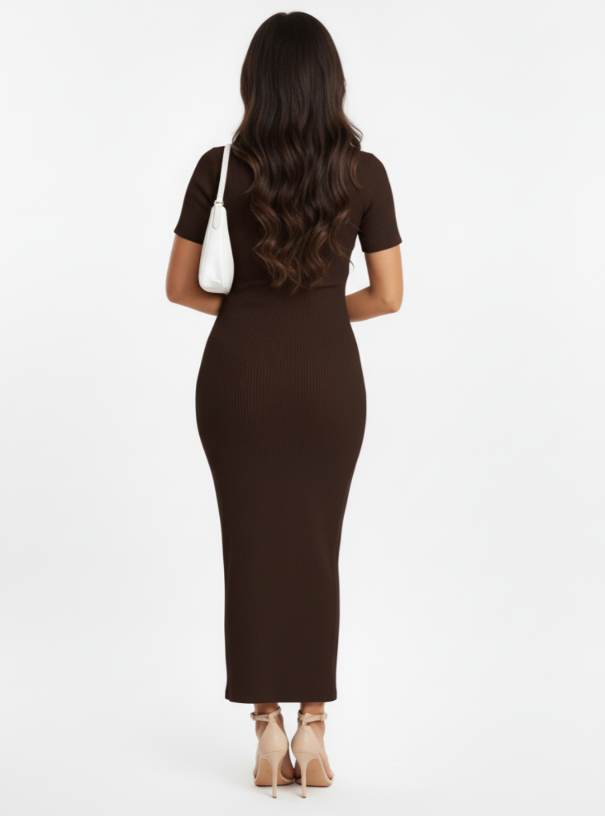 Woman wearing a brown dress on a white background