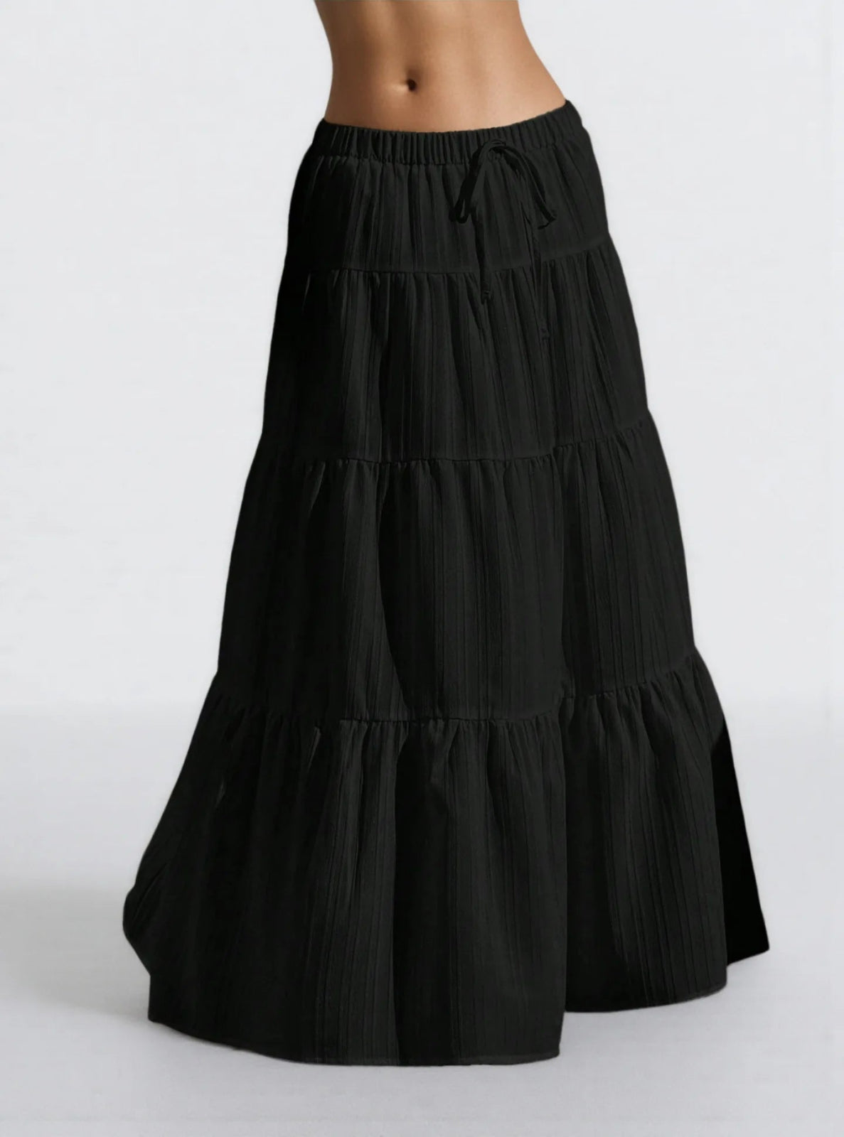 Black tiered skirt on a white background