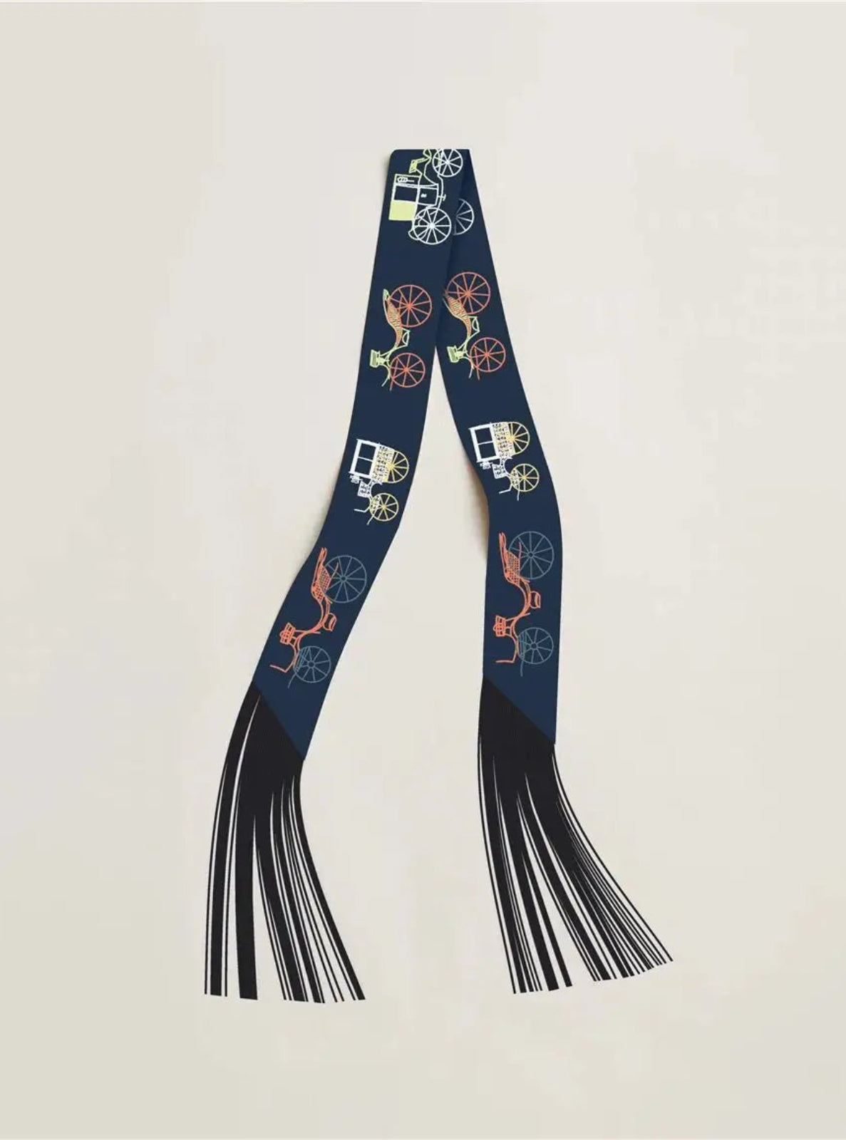 Navy blue strap with horse and carriage design on a light beige background