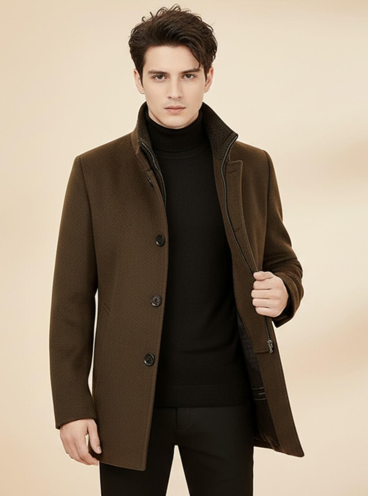 Man wearing a brown coat against a beige background